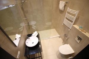 Koupelna v ubytování Super Luxury Apartments