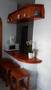Kuchyň nebo kuchyňský kout v ubytování Residencial Sol Suite 2