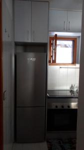 Kuchyň nebo kuchyňský kout v ubytování Residencial Sol Suite 2