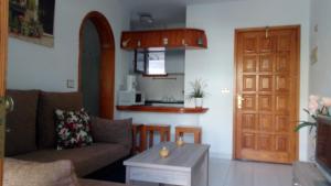 Kuchyň nebo kuchyňský kout v ubytování Residencial Sol Suite 2
