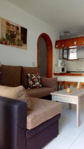 Posezení v ubytování Residencial Sol Suite 2
