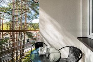Balkon lub taras w obiekcie APARTAMENT 19B BLUE MARINE Poddąbie Basen Odkryty Brodziki Plac Zabaw