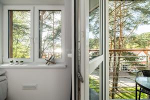 Balkon lub taras w obiekcie APARTAMENT 19B BLUE MARINE Poddąbie Basen Odkryty Brodziki Plac Zabaw