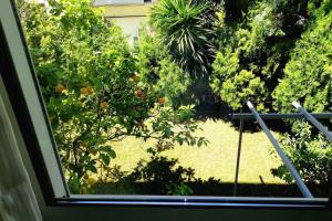 Vonkajšia záhrada v ubytovaní Lefkada SunCentral Apartments