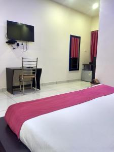 Μια τηλεόραση ή/και κέντρο ψυχαγωγίας στο Hotel Reyansh