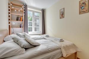 Кровать или кровати в номере Comfort Apartments Old Town Ogarna