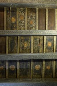 a room with a wooden wall with ornate ceilings at Palazzo Cavalli Pasquini in Verona