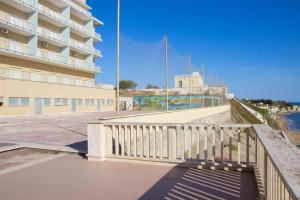 a staircase in front of a building with a mural at Stella Maris Casa per ferie sul mare in Anzio