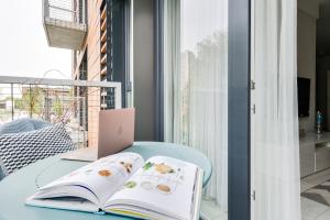 Posteľ alebo postele v izbe v ubytovaní Elite Apartments Downtown Premium