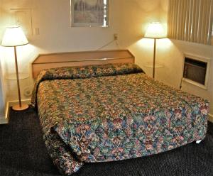 Postel nebo postele na pokoji v ubytování Hub Motel