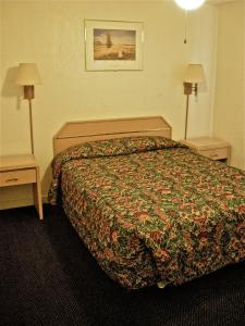 Postel nebo postele na pokoji v ubytování Hub Motel