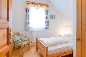 Posteľ alebo postele v izbe v ubytovaní Ferienwohnung Stiegelbauer Fichte