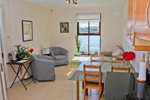 אזור ישיבה ב-The Herons Rest Boutique Accommodation