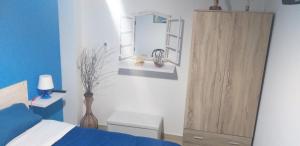 Postel nebo postele na pokoji v ubytování Casa Vacanze Trinacria