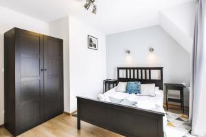 Posteľ alebo postele v izbe v ubytovaní Apartamenty GÓRKA