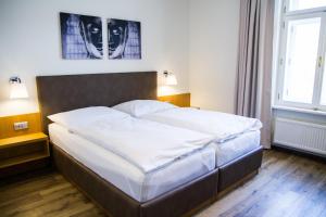 Postel nebo postele na pokoji v ubytování APART U LVA