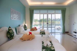 Lova arba lovos apgyvendinimo įstaigoje Tubtim Siam River Kwai Resort