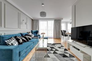 Telewizja i/lub zestaw kina domowego w obiekcie Blue Mandarin Marina