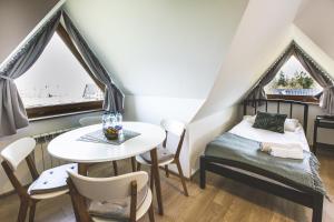 Posteľ alebo postele v izbe v ubytovaní Apartamenty GÓRKA