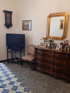 TV a/nebo společenská místnost v ubytování casa del sole