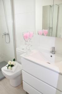 A bathroom at Shiny Per Family Apartment Még 36 kép