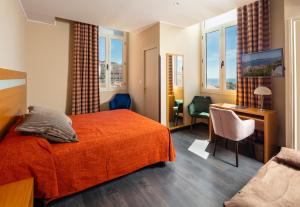 Ένα ή περισσότερα κρεβάτια σε δωμάτιο στο Hotel Miramar