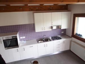 Kuchyň nebo kuchyňský kout v ubytování Alloggio Agrituristico Ai Tre Castelli