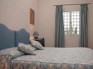 Postel nebo postele na pokoji v ubytování Vignagrande Agriturismo