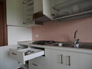 Kuchyň nebo kuchyňský kout v ubytování Alloggio Agrituristico Ai Tre Castelli