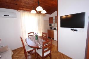 TV a/nebo společenská místnost v ubytování Guest House Milotic