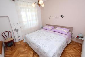 Postel nebo postele na pokoji v ubytování Guest House Milotic