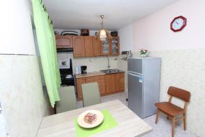 Kuchyň nebo kuchyňský kout v ubytování Guest House Milotic