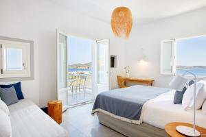 Milos Breeze Boutique Hotel客房内的一张或多张床位