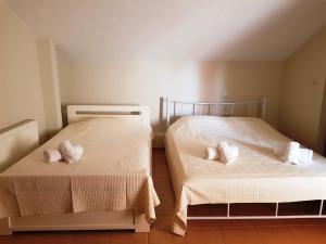 Postel nebo postele na pokoji v ubytování Stasa Luxury Apartments