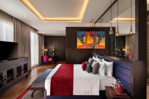 Sandal Suites by Lemon Tree Hotels客房内的一张或多张床位