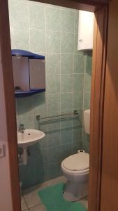 Koupelna v ubytování Apartmani AB + 6 fotografií