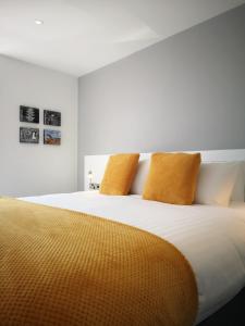 A bed or beds in a room at Mode Hotel Lytham