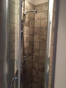 a shower with a glass door in a bathroom at La Taverna @ Casale Corneto in Bomba +25 photos