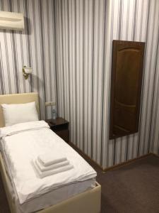 Katil atau katil-katil dalam bilik di Astoria