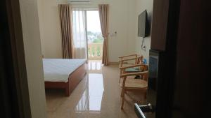 Μια τηλεόραση ή/και κέντρο ψυχαγωγίας στο Camellia Hotel