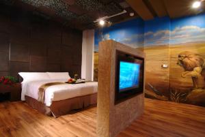 Postel nebo postele na pokoji v ubytování Takao Love Motel