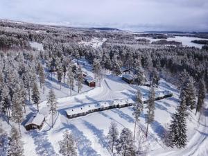 an aerial view of a train station in the snow at Åsarna Skicenter in Åsarne