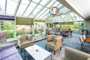 A restaurant or other place to eat at Park Farm Hotel 