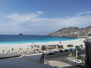a view of a beach and the ocean at Casa da Luz - Appartement in Mindelo