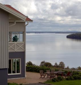 a house with a view of a lake at Wångens Wärdshus in Alsen