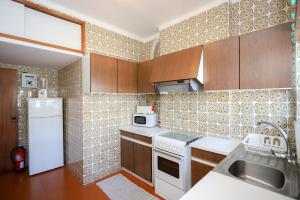 Køkken eller tekøkken på Figueira da Foz Sunset Apartment