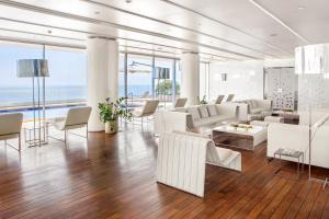 Гостиная зона в Elounda Beach Hotel & Villas, a Member of the Leading Hotels of the World