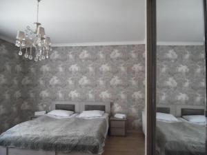 Postel nebo postele na pokoji v ubytování Guest House Tamta