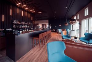 Χώρος καθιστικού στο Umi Hotel