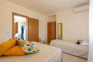 Una cama o camas en una habitación de Al Ficodindia
